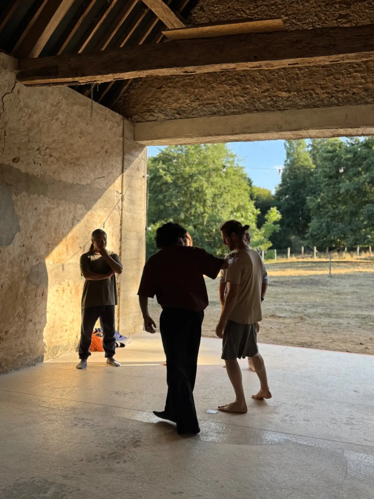Harshit guiding participants through a movement exploration