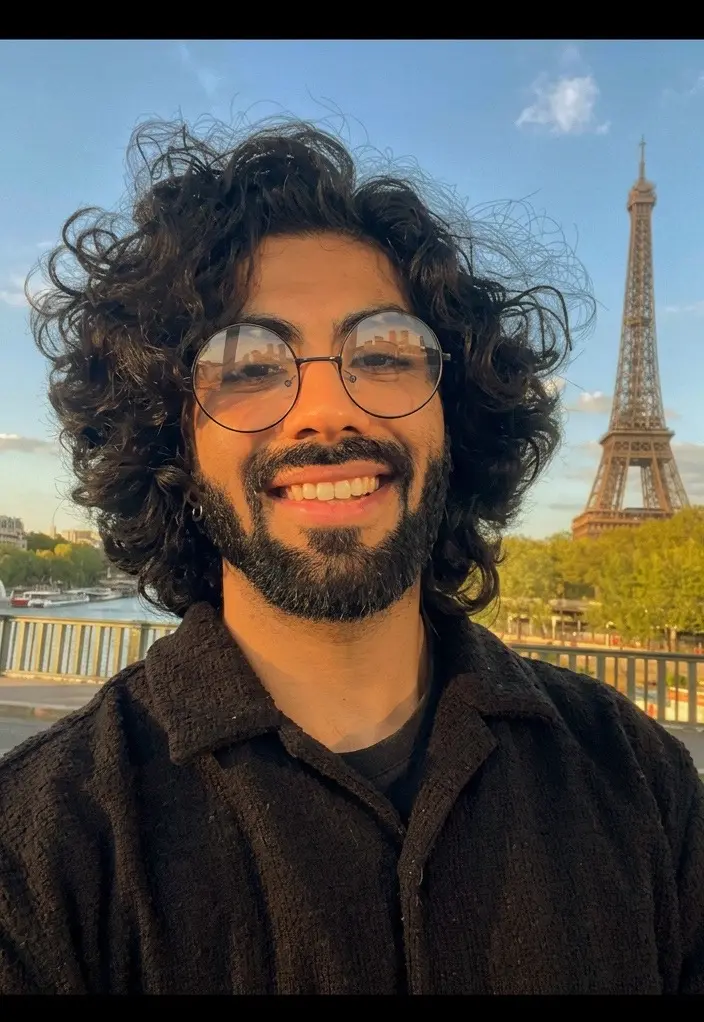 Harshit in Paris with the Eiffel Tower