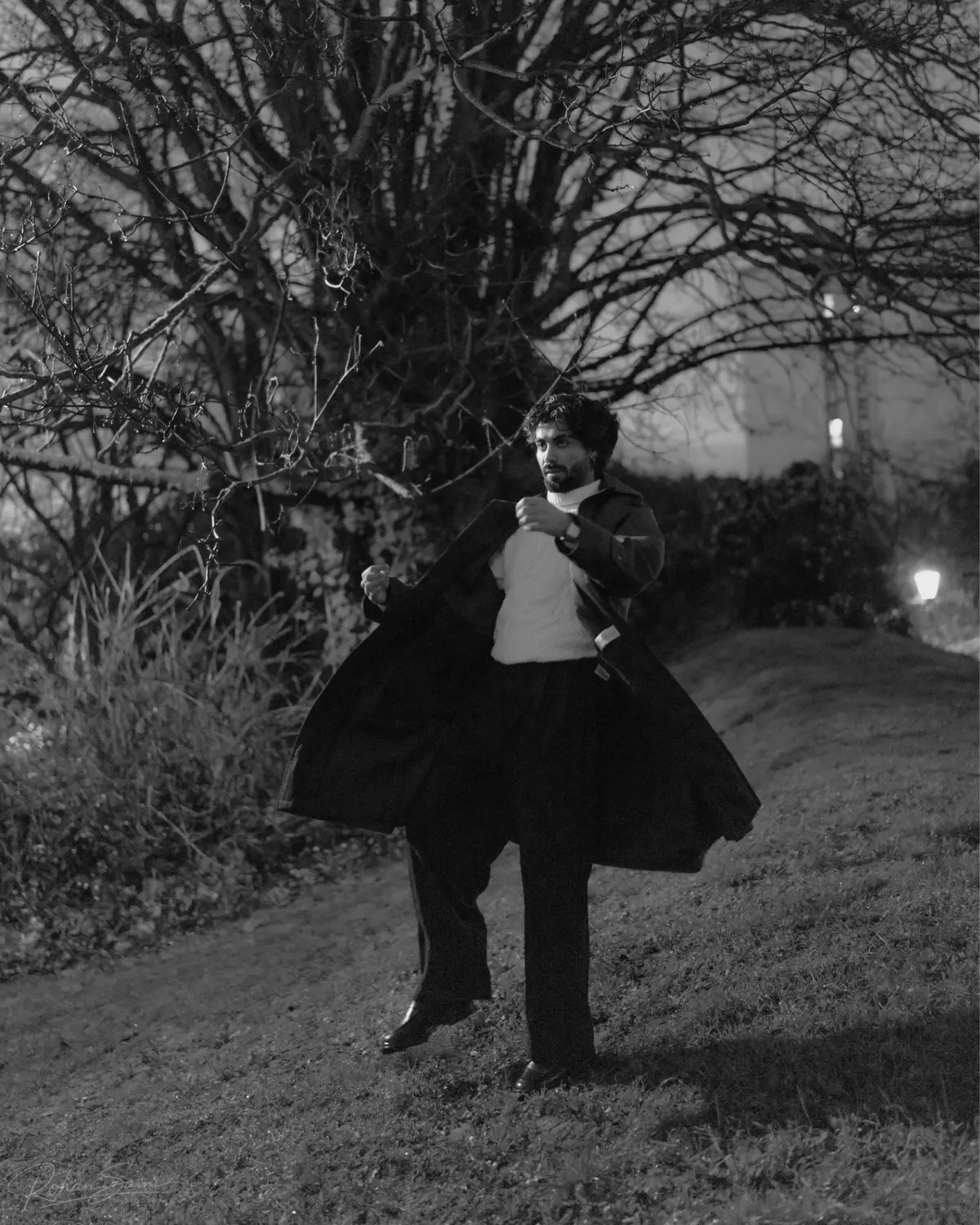 Harshit moving in a black and white landscape